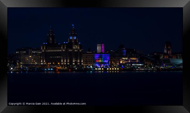 The Liverpool skyline lit up at night Framed Print by Marcia Reay