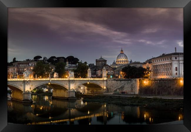 St Peters Basilica and Ponte Sant Angelo in Rome Framed Print by Chris Jones