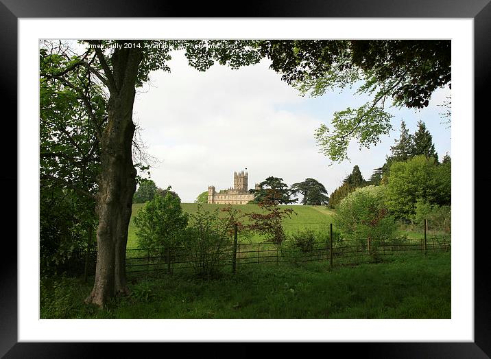 The famous Downton Abbey on top of the hill Framed Mounted Print by James Tully