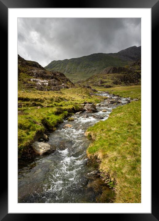 The Afon Cwm Llan by the Watkin Path in the mountains of Snowdonia Framed Mounted Print by Andrew Kearton