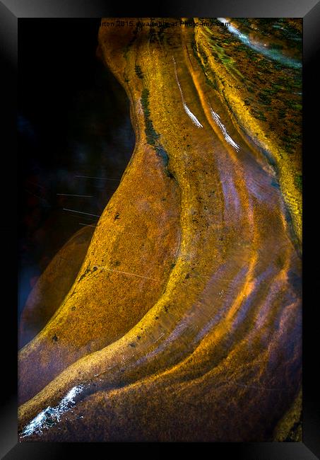 Golden rock beneath the water Framed Print by Andrew Kearton