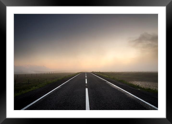  Road over the misty moors at sunset Framed Mounted Print by Andrew Kearton