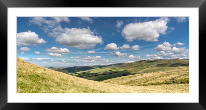Fluffy clouds over the hills Framed Mounted Print by Andrew Kearton