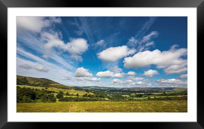 Fluffy clouds over Glossop Framed Mounted Print by Andrew Kearton