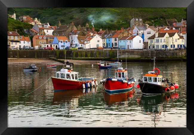 Boats in the harbour, Staithes, North Yorkshire Framed Print by Andrew Kearton