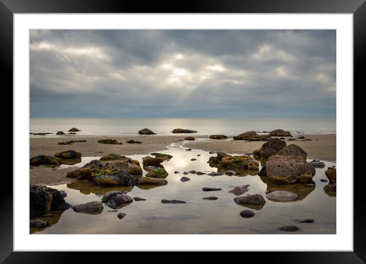 Looking out to sea on Criccieth beach Framed Mounted Print by Andrew Kearton