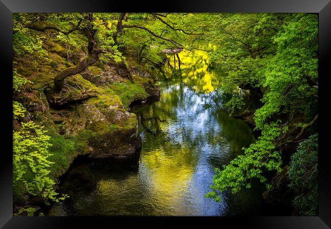Colour reflected in the Afon Glaslyn, North Wales Framed Print by Andrew Kearton