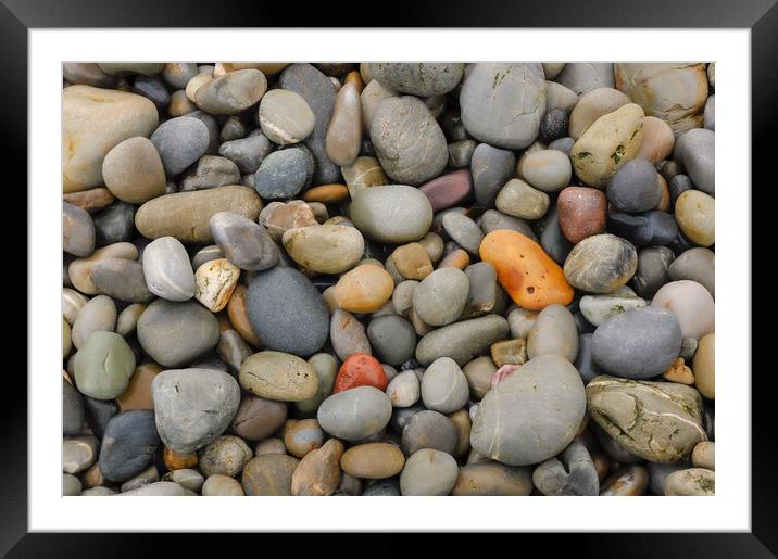 Smooth beach pebbles Framed Mounted Print by Andrew Kearton
