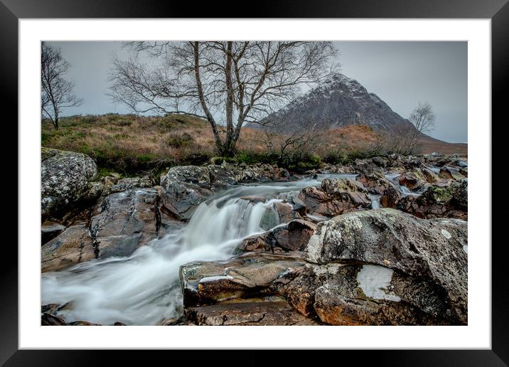 Low Winter waterflows past the Buckle Framed Mounted Print by John Malley