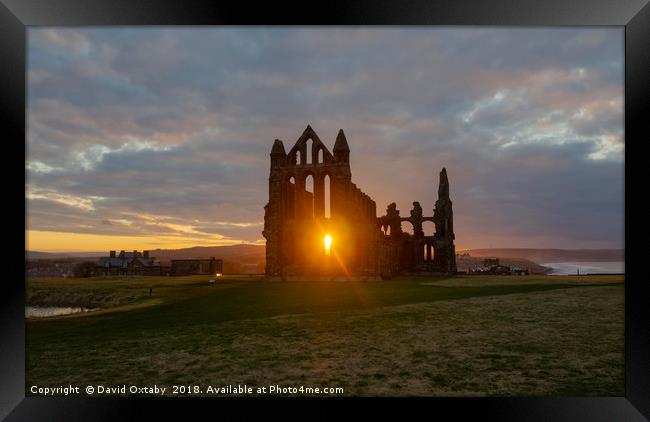 Sun setting at Whitby Abbey Framed Print by David Oxtaby  ARPS