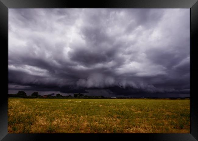 Facing the Storm Framed Print by Colin Askew