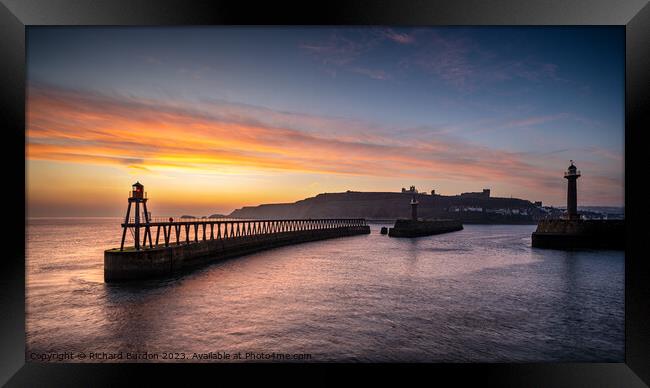 Winter Sunrise Over Whitby Piers Framed Print by Richard Burdon