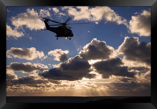 helicopter in sunbeams Framed Print by Gail Johnson