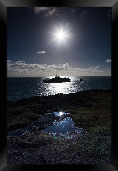 Boat and sun Framed Print by Gail Johnson