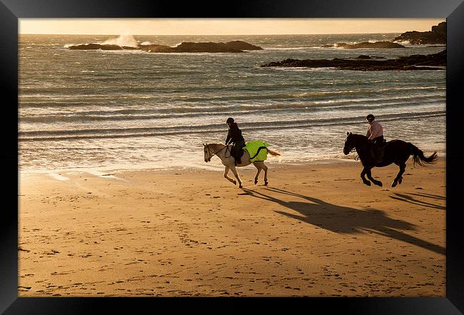 Horse riders at sunset Framed Print by Gail Johnson