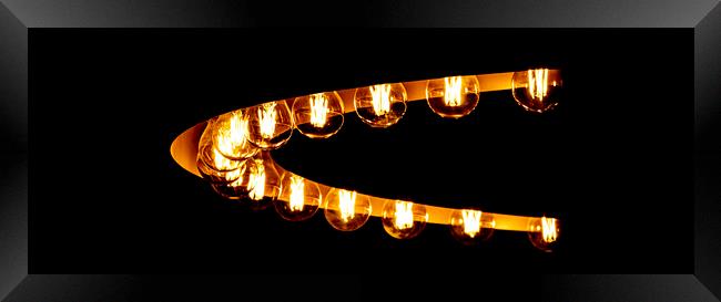 Arc of LED Bulbs Framed Print by Glen Allen