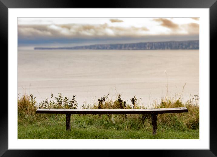 A bench view over Filey Bay Framed Mounted Print by Glen Allen