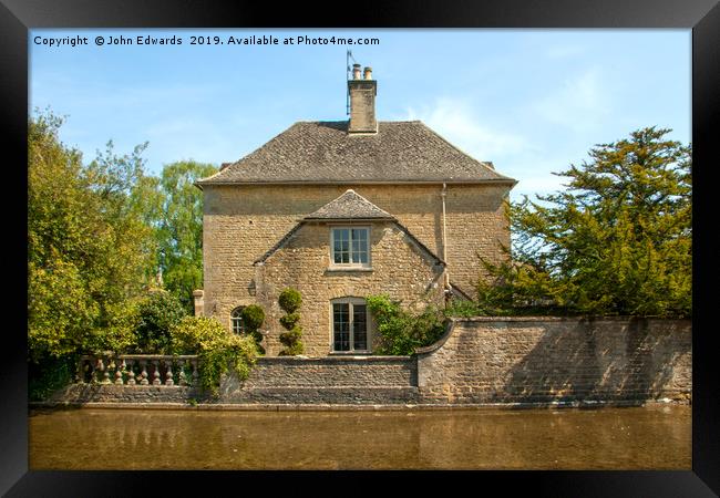 Riverside, Bourton-on-the-Water Framed Print by John Edwards