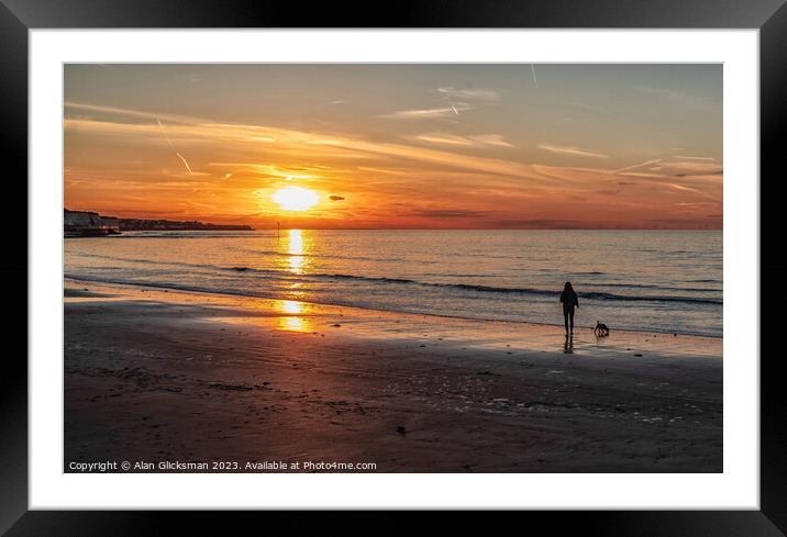 Walk along the beach at sunset Framed Mounted Print by Alan Glicksman