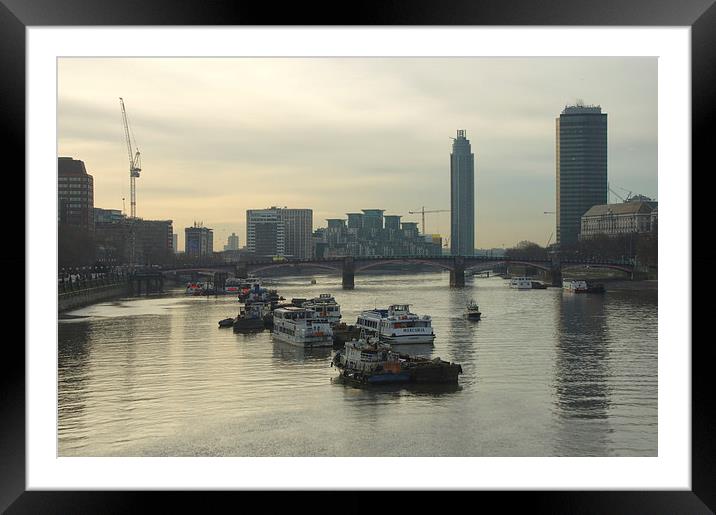 A carm day with boats along the river thames Framed Mounted Print by Alan Glicksman