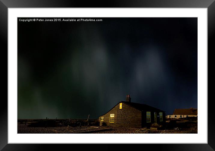 Sky over famous cottage Dungeness, Kent, UK Framed Mounted Print by Peter Jones