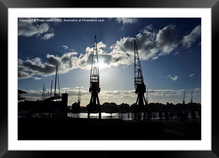 London Docklands Cranes Silhouette.  Framed Mounted Print by Peter Jones