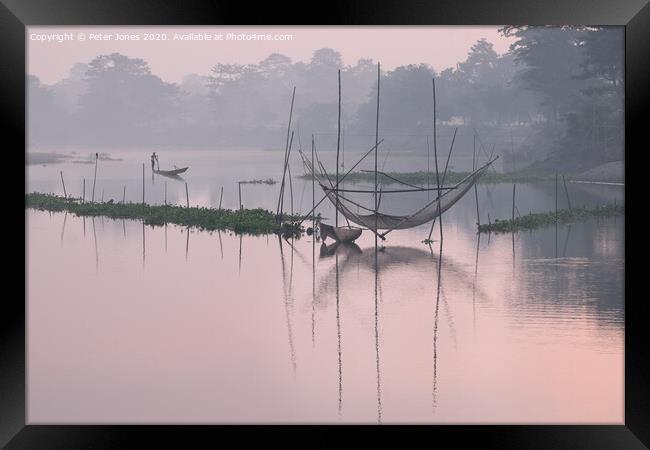 Dawn fishing nets Framed Print by Peter Jones