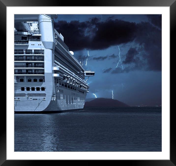 Cruise ship with lightning strikes in distance Framed Mounted Print by ken biggs