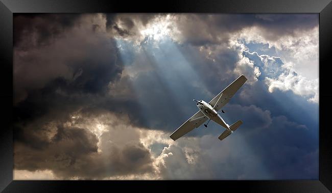 Small fixed wing plane against a stormy sky Framed Print by ken biggs
