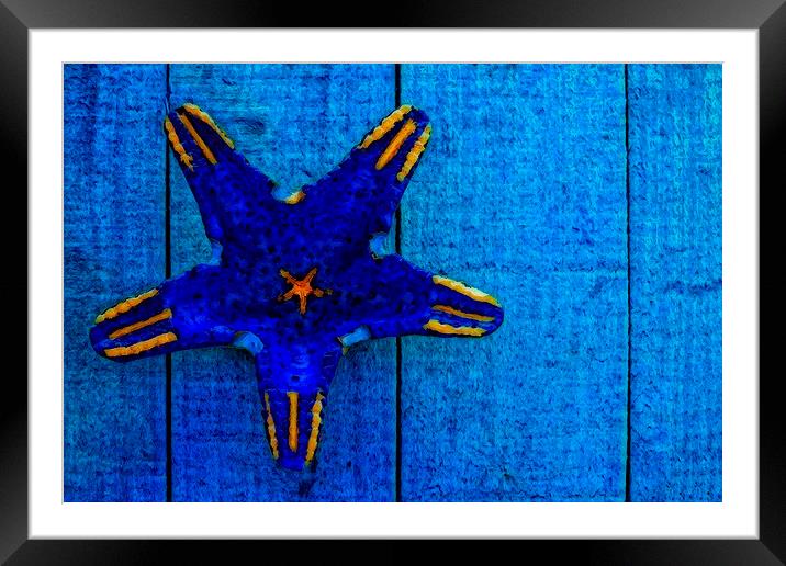 starfish shape on blue wooden boards Framed Mounted Print by ken biggs