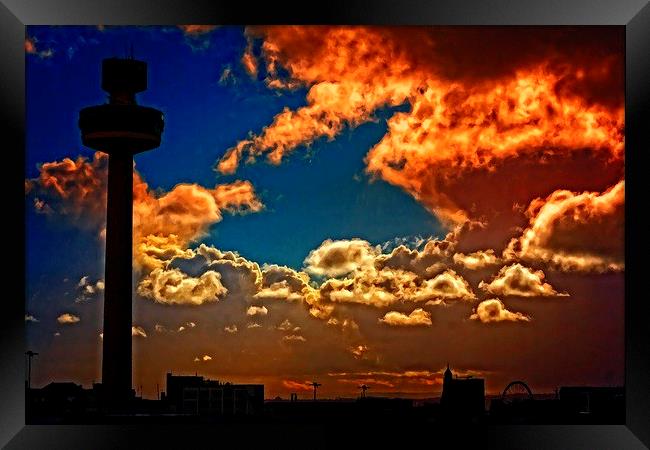 Liverpool skyline in silhouette against a stormy s Framed Print by ken biggs