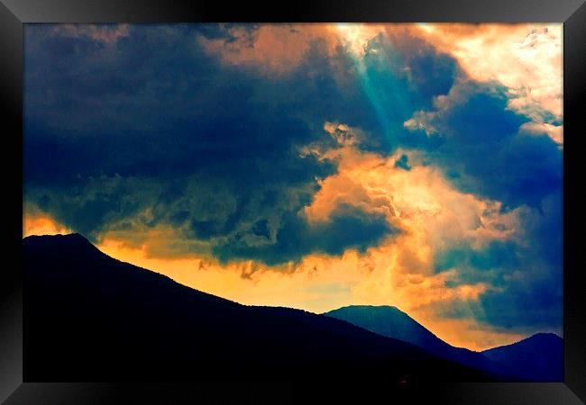 sunrays on a stormy day  Framed Print by ken biggs