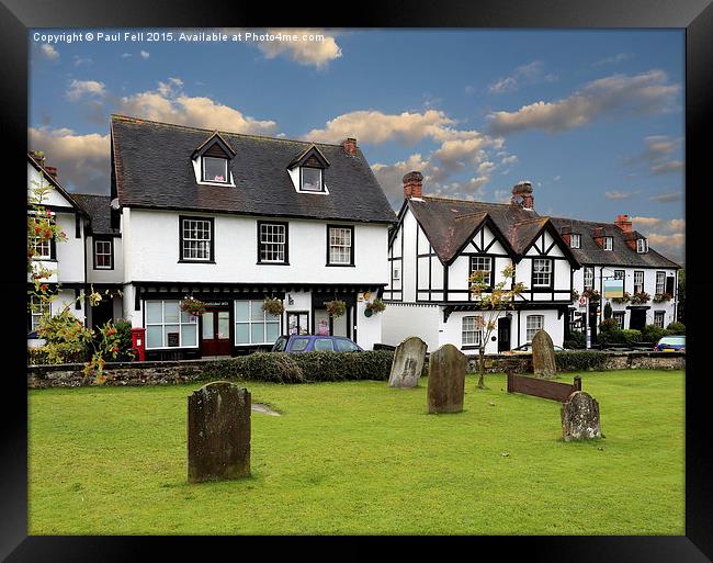 An English Village Framed Print by Paul Fell