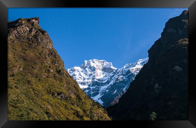  snow covered mountain range Framed Print by Ambir Tolang