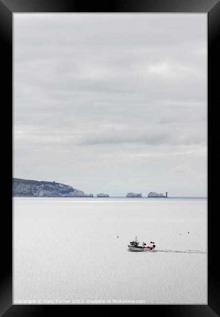 Fishing By The Needles Framed Print by Gary Turner