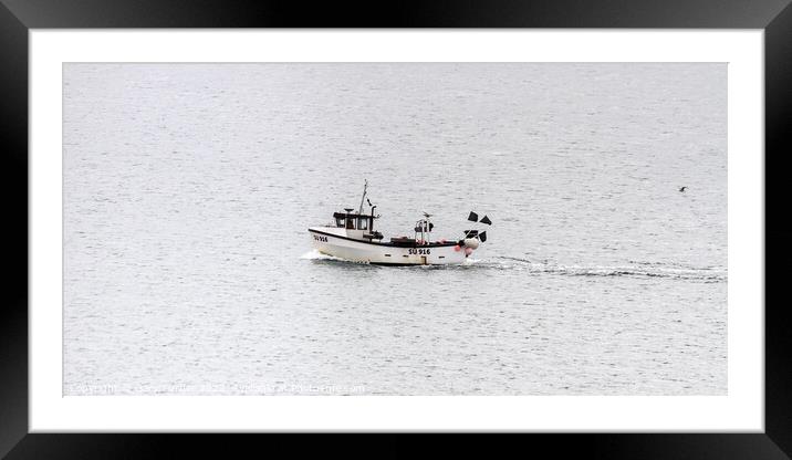 Fishing boat off the coast of Hampshire Framed Mounted Print by Gary Turner