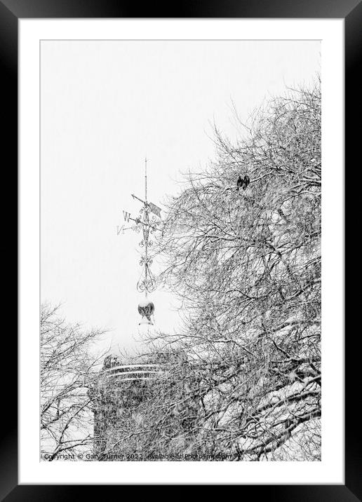 Snow covered church spire Framed Mounted Print by Gary Turner
