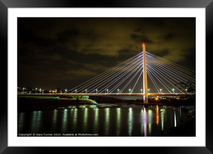 Northern Spire At Night Framed Mounted Print by Gary Turner
