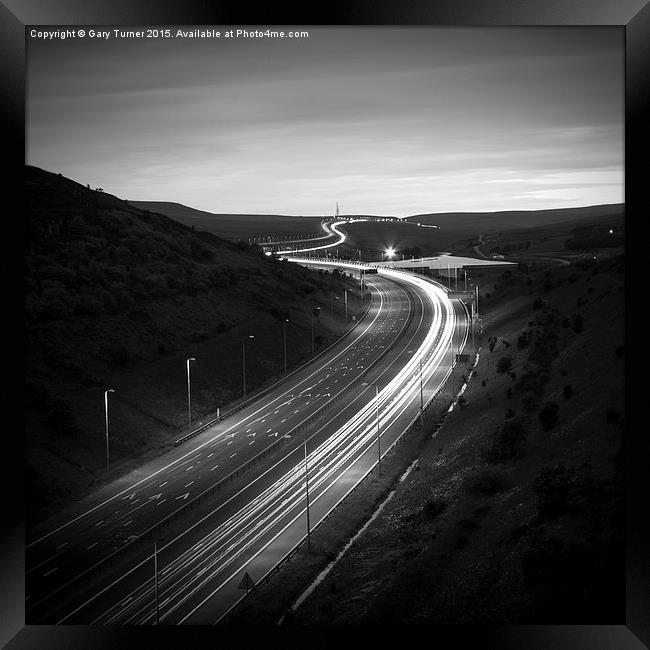 Motorway Trails Framed Print by Gary Turner
