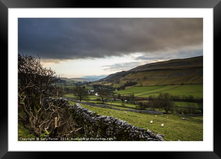 Dark Clouds over Kettlewell Framed Mounted Print by Gary Turner