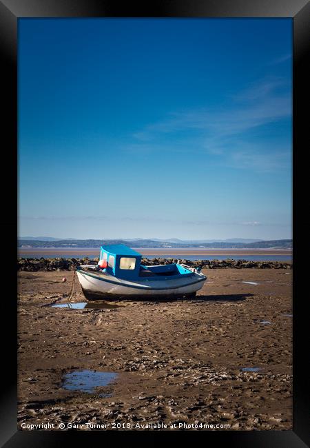 Waiting for the tide Framed Print by Gary Turner