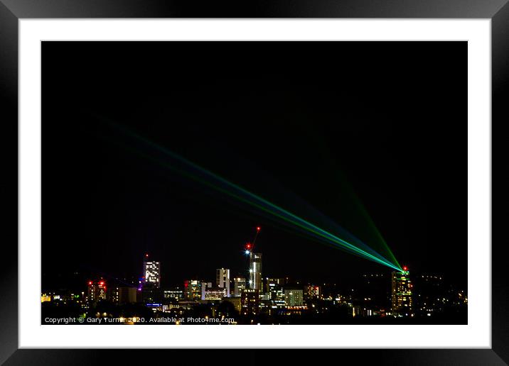 Leeds skyline with Leeds Laser Light Night Framed Mounted Print by Gary Turner