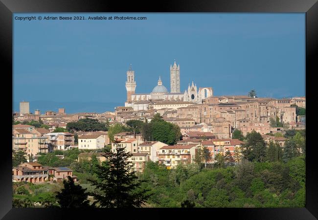 Siena in Tuscany Cityscape Framed Print by Adrian Beese