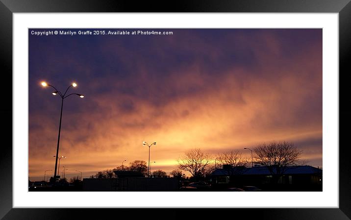 Sunset over the parking lot  Framed Mounted Print by Marilyn Graffe