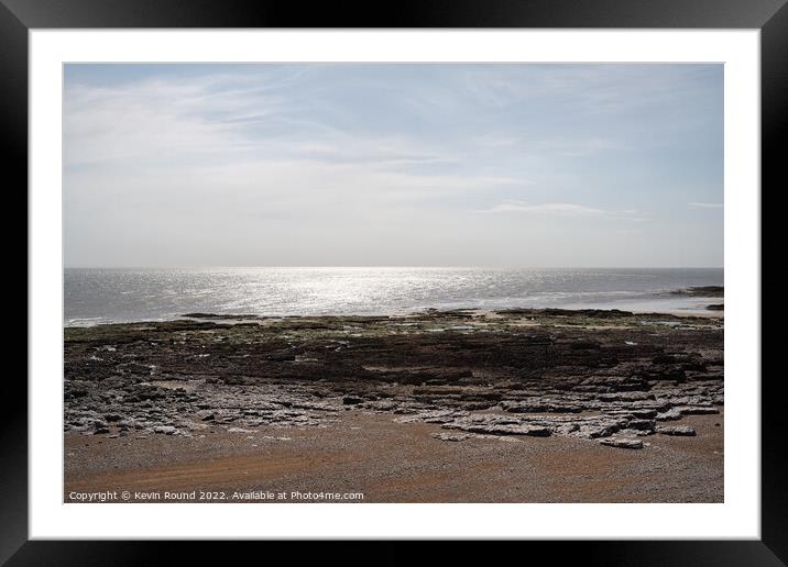 Sun reflects Porthcawl Wales Framed Mounted Print by Kevin Round