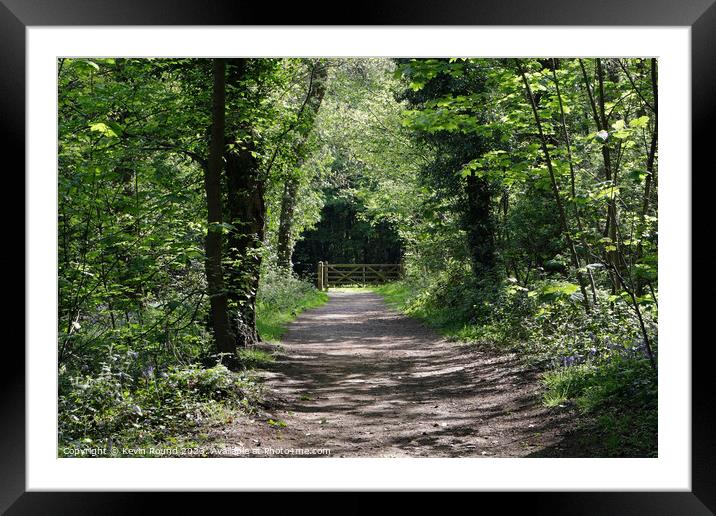 Woodland gate Framed Mounted Print by Kevin Round