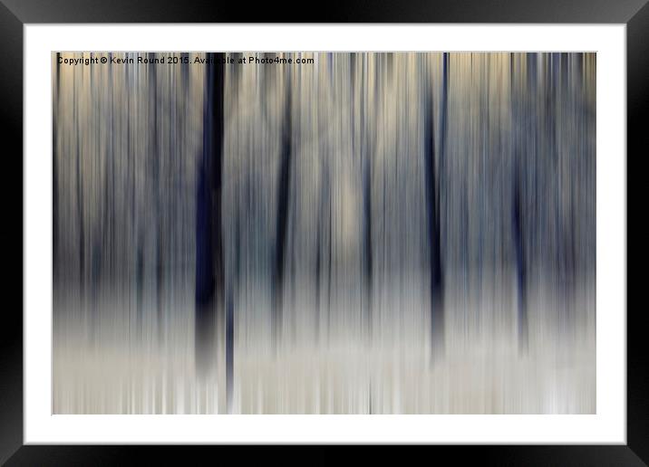 Blurred Wintry Wood Framed Mounted Print by Kevin Round