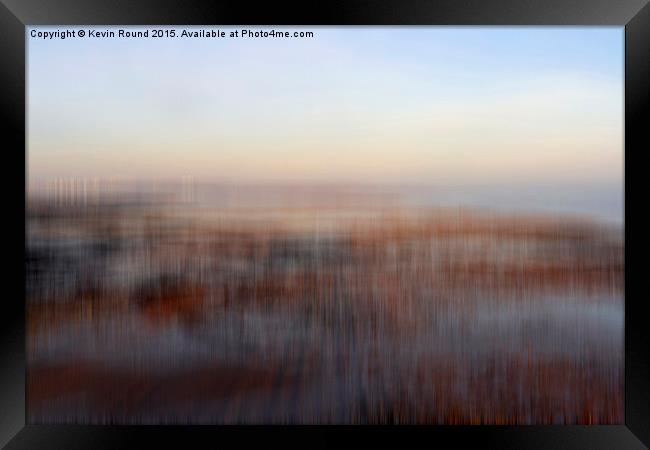 Blurred Cold Winter Beach Framed Print by Kevin Round