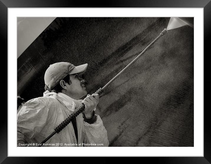 Power washing and antifouling the underside of a s Framed Mounted Print by Eyal Nahmias