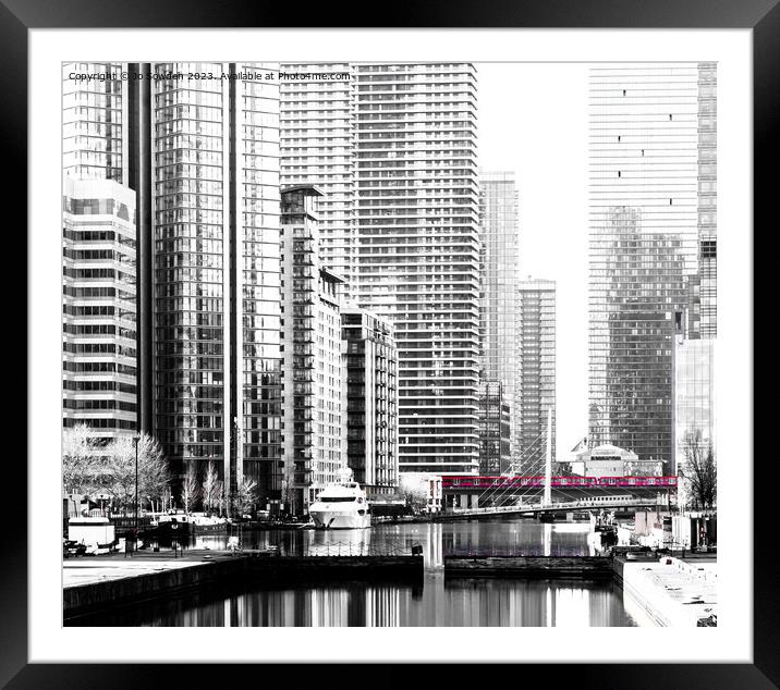 Docklands Light Railway passing through Canary Wha Framed Mounted Print by Jo Sowden